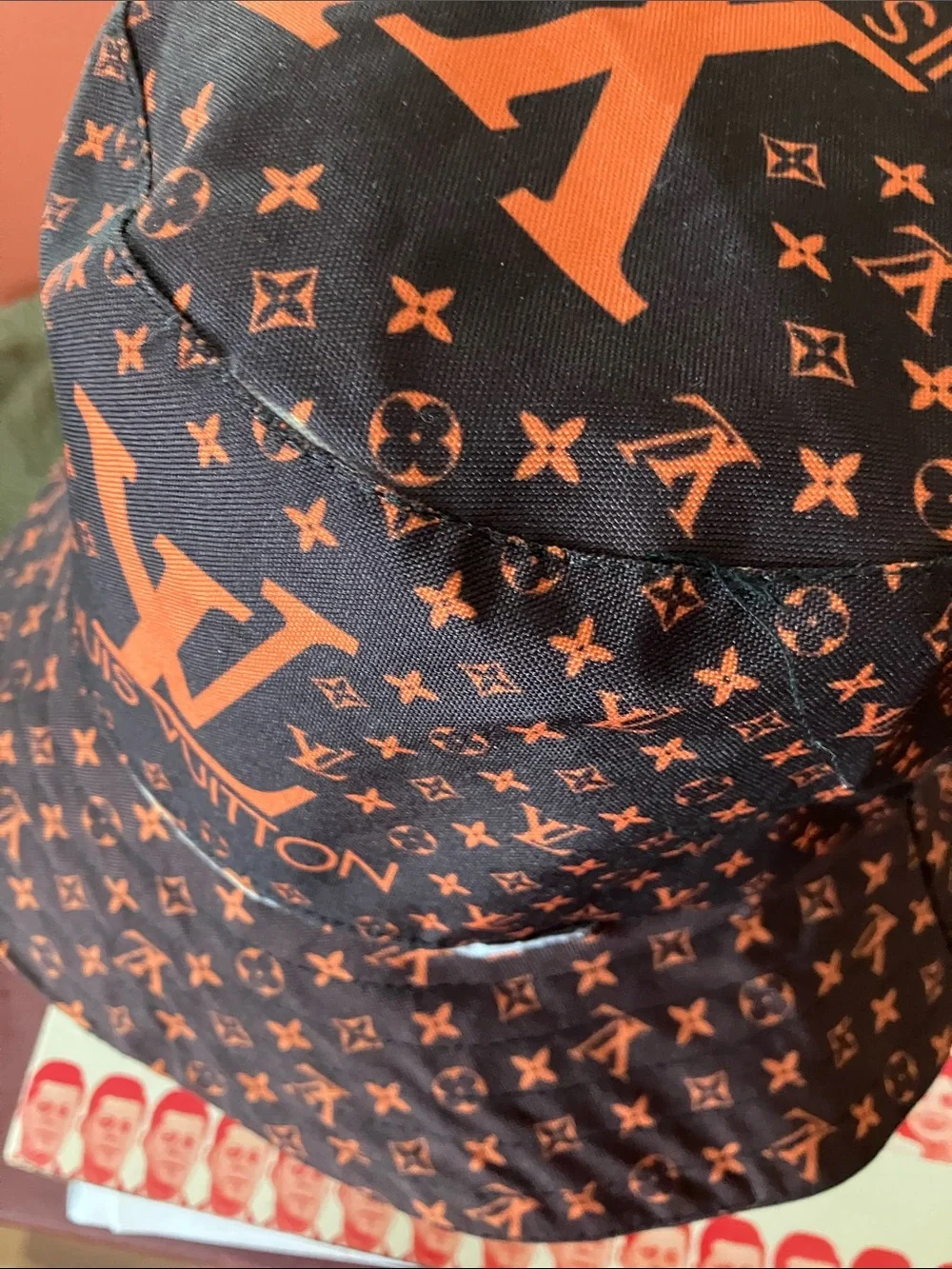 FauxLouis Vuitton Navy and Orange Monogram Bucket Hat.
